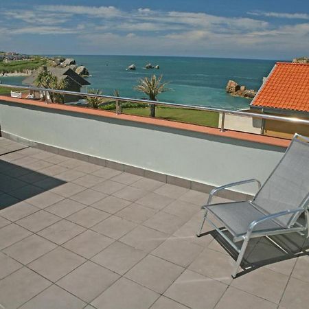 Apartamentos Playa De Portio Льенкрес Экстерьер фото