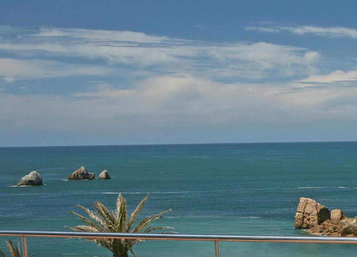 Apartamentos Playa De Portio Льенкрес Экстерьер фото