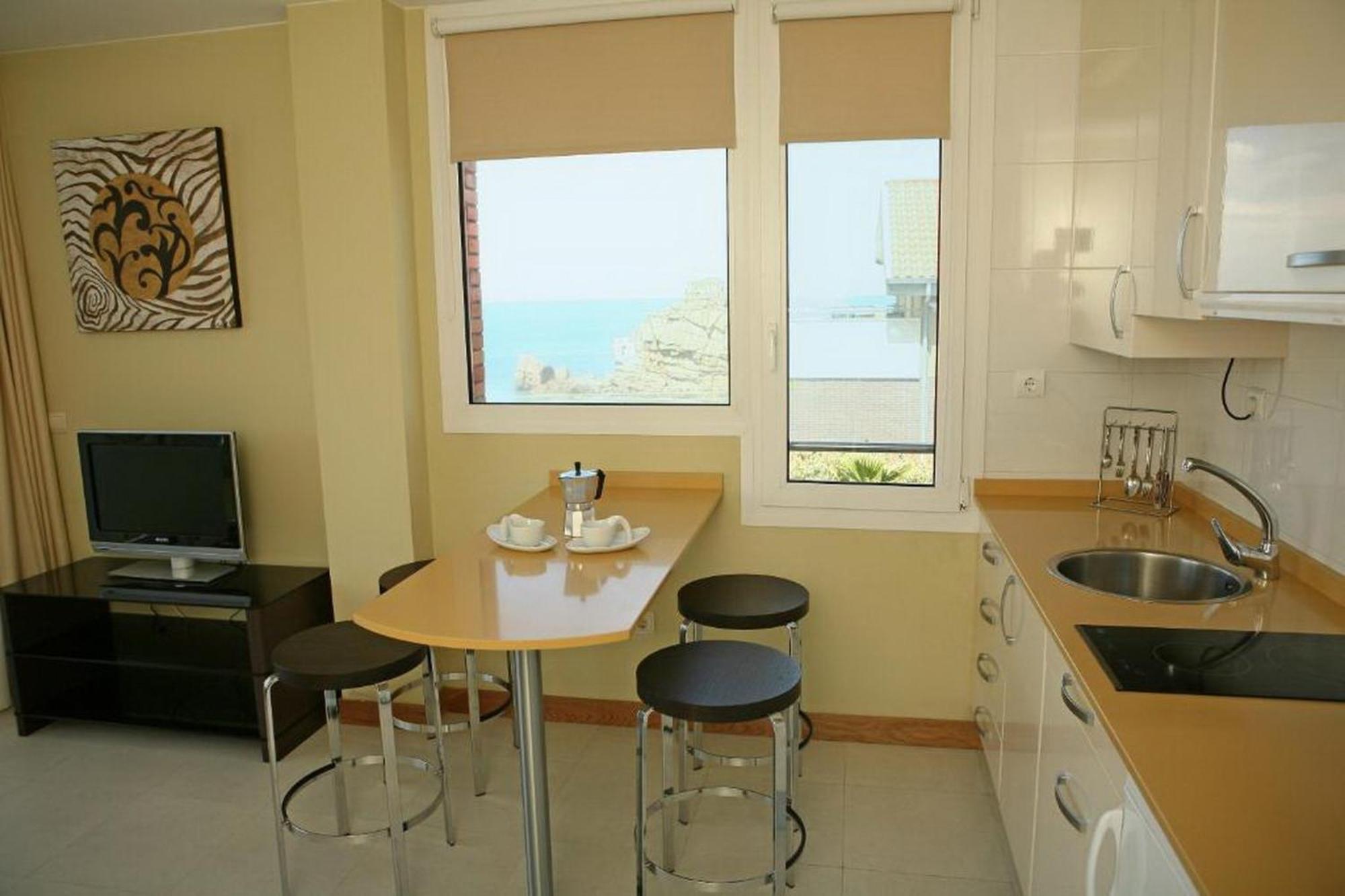 Apartamentos Playa De Portio Льенкрес Экстерьер фото