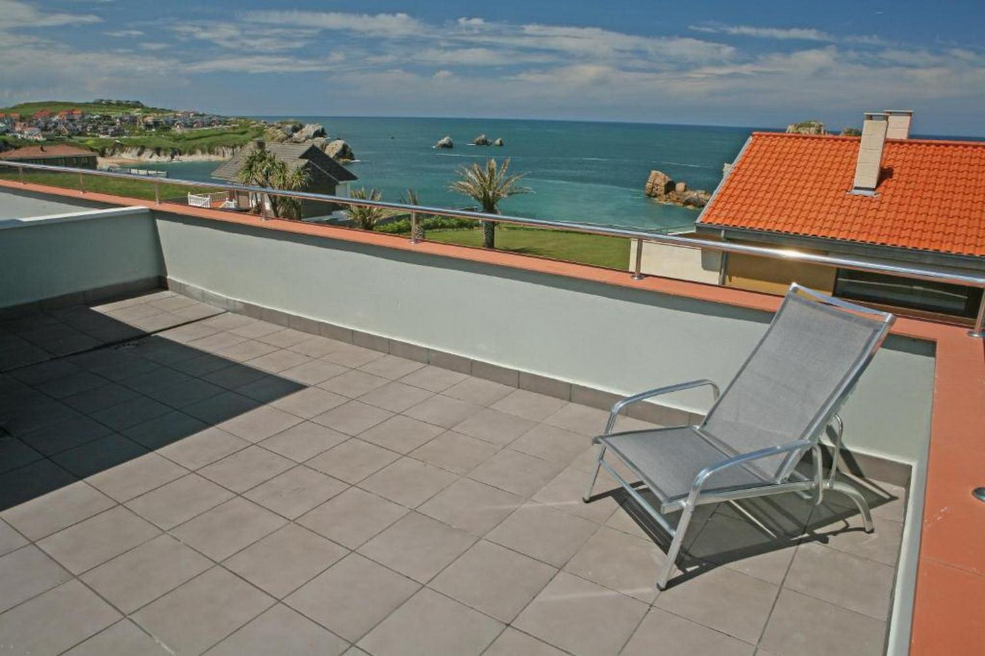 Apartamentos Playa De Portio Льенкрес Экстерьер фото