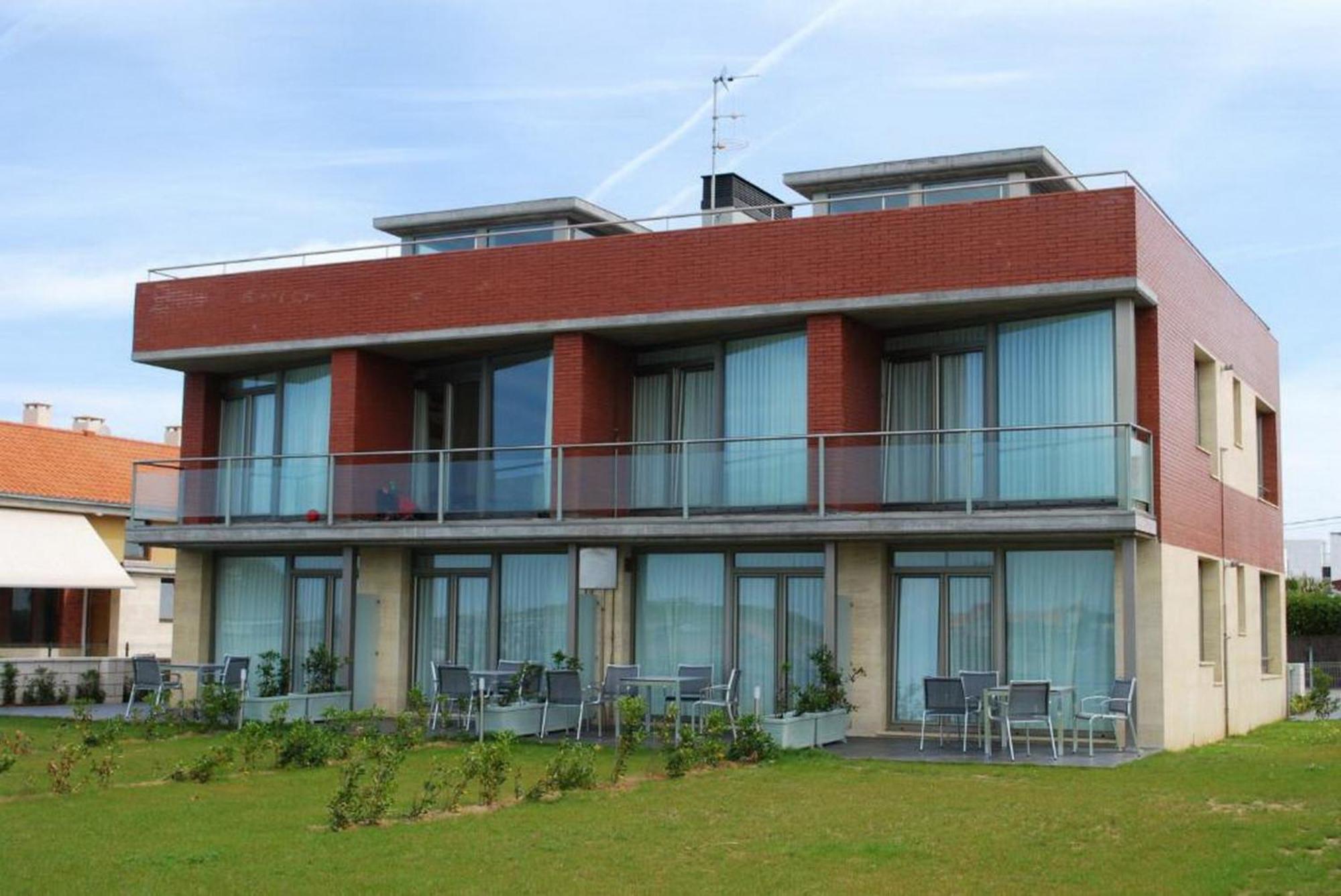 Apartamentos Playa De Portio Льенкрес Экстерьер фото